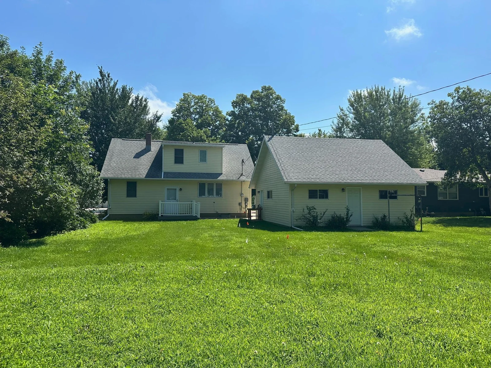 Back of home showing large yard