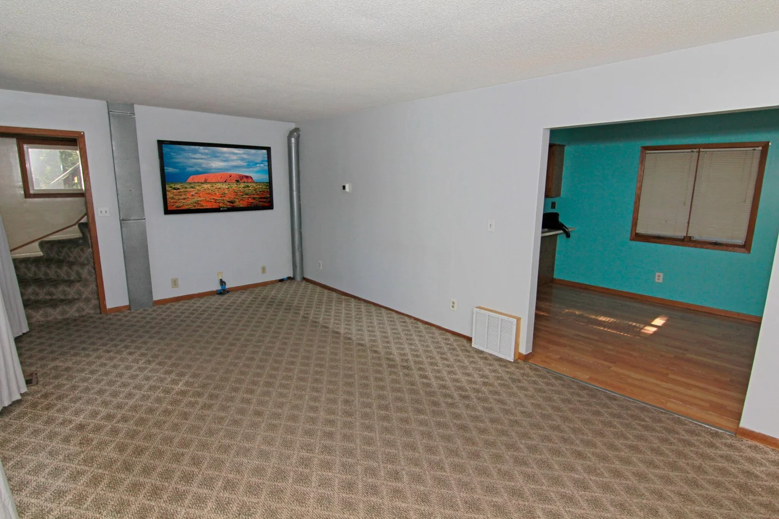 TV and wall mount included.