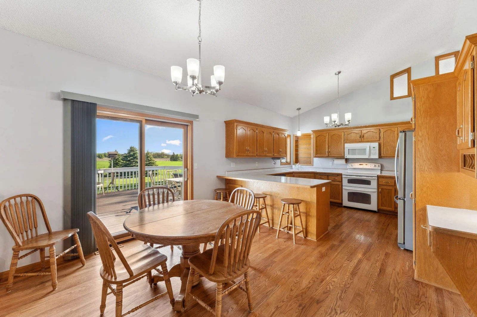 Dining Room with kitchen in background