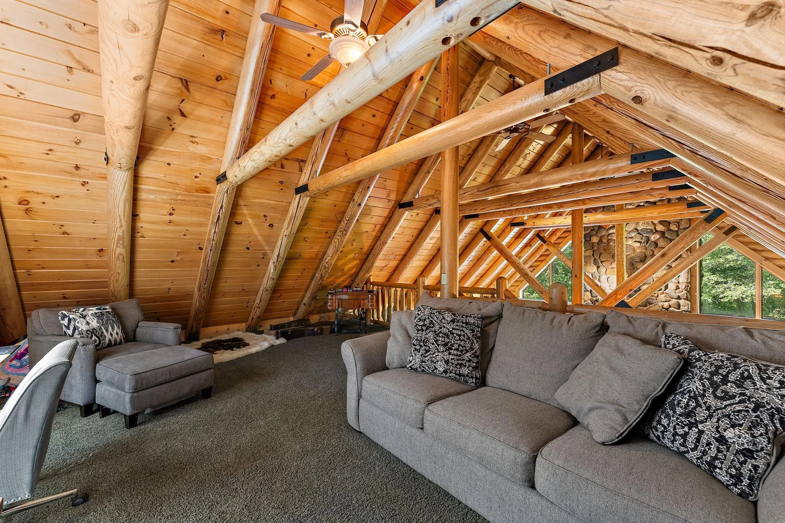 The loft is a great get-away spot, perfect for your TV room, playing your guitar or a home office