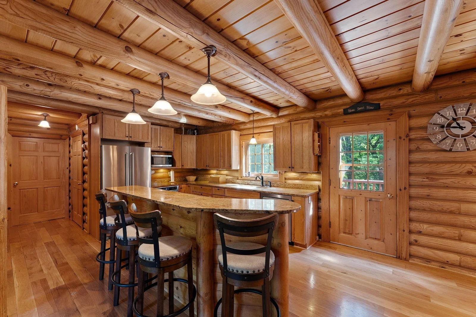 Back door leads out to the large, back deck and hot tub!