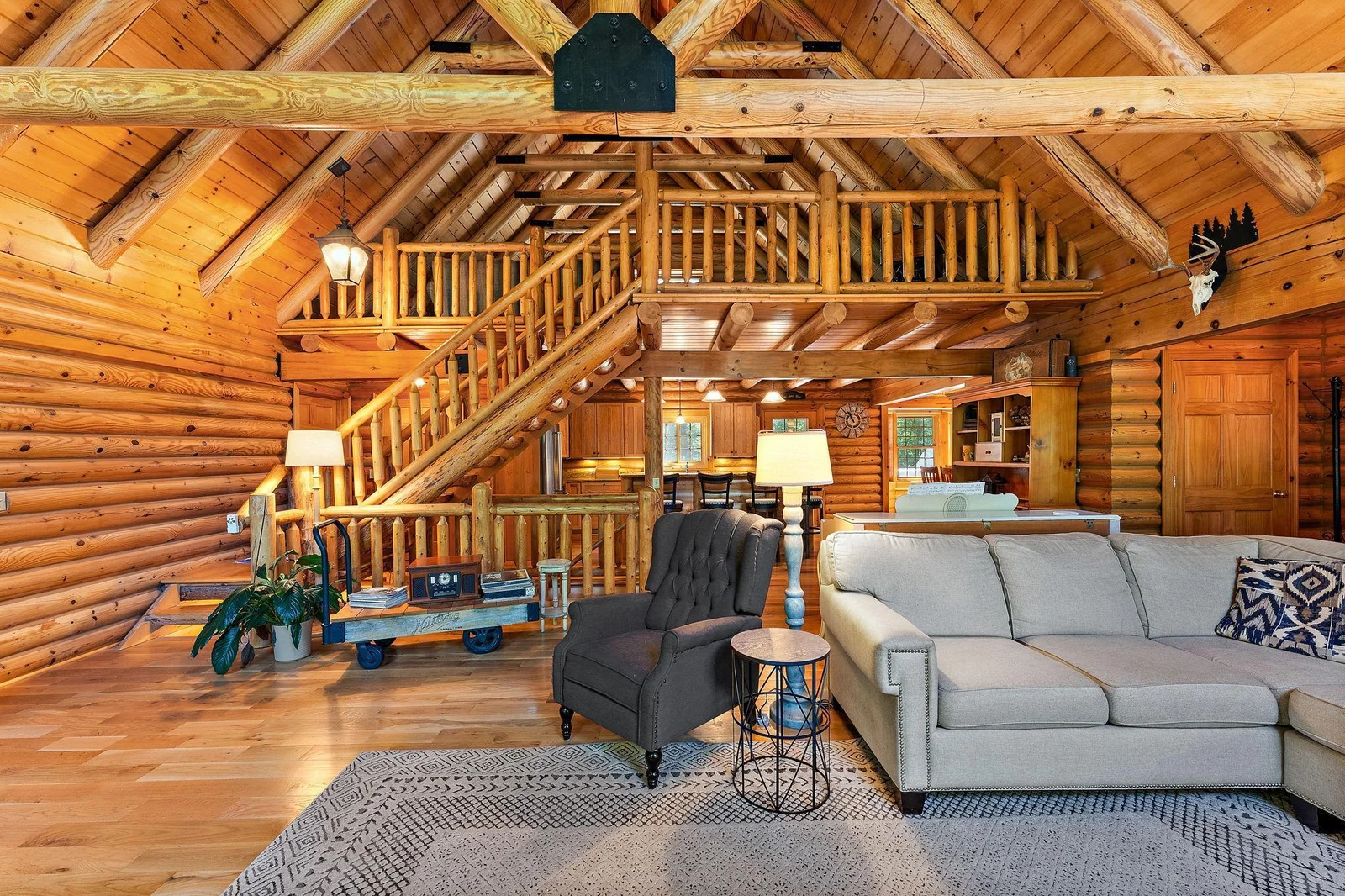 Beautiful railings and woodwork throughout the home!  All the logs have been sanded and restained, inside and out, as well as chinking.