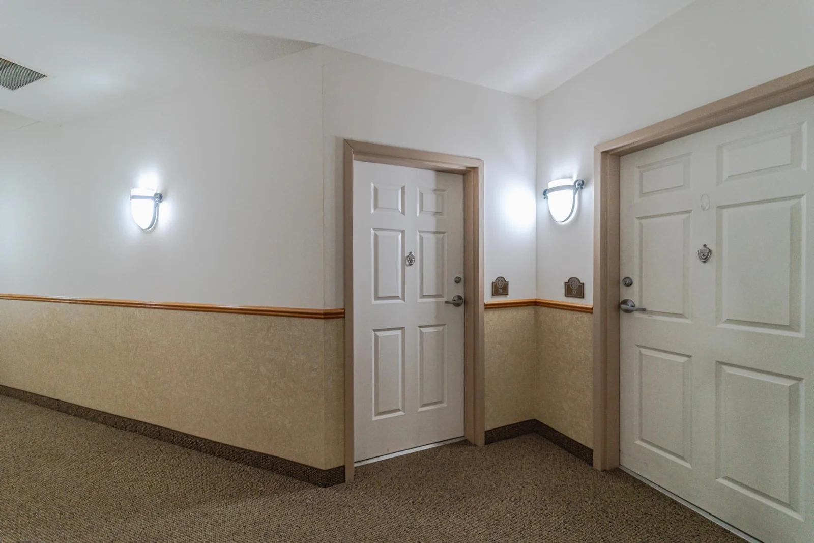 The unit has a secondary entrance inside the building