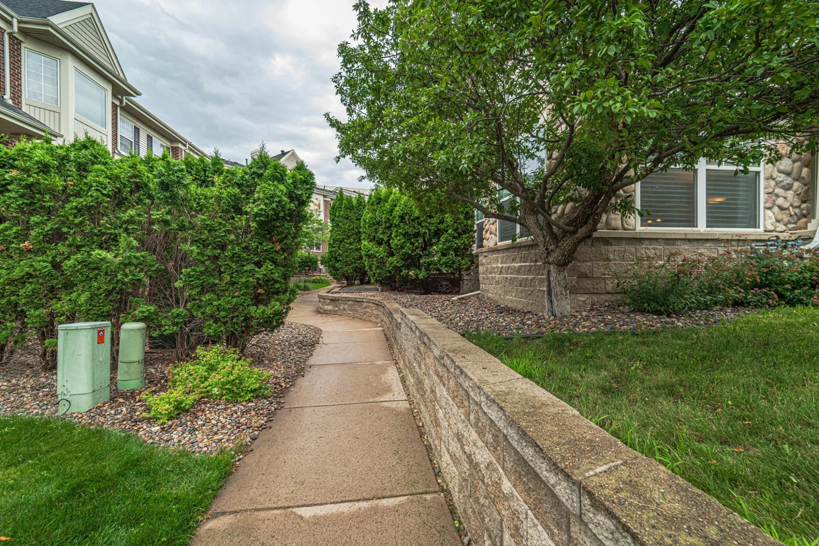 private tree lined walkway in the community