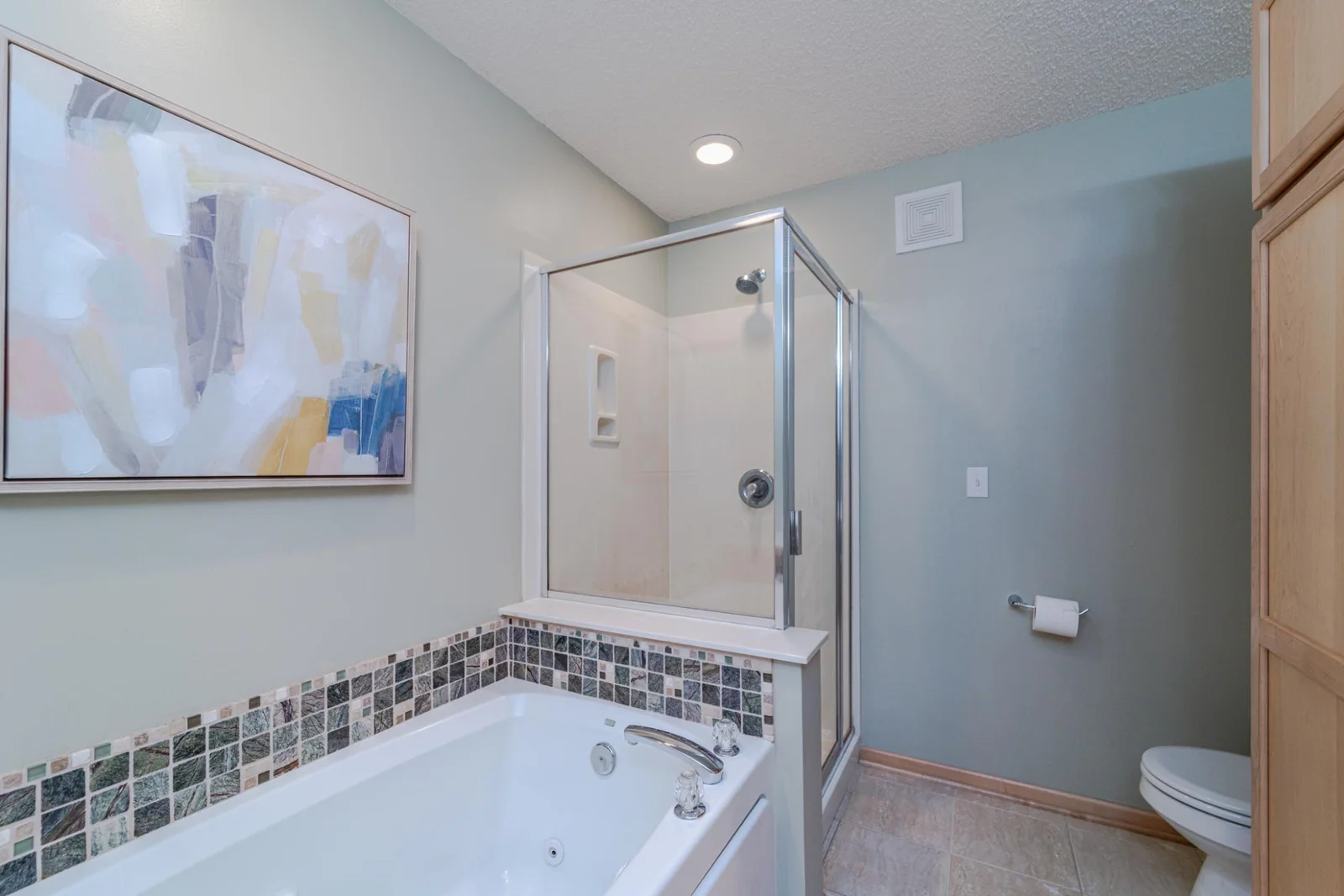 Separate Tub and Shower in the primary bathroom