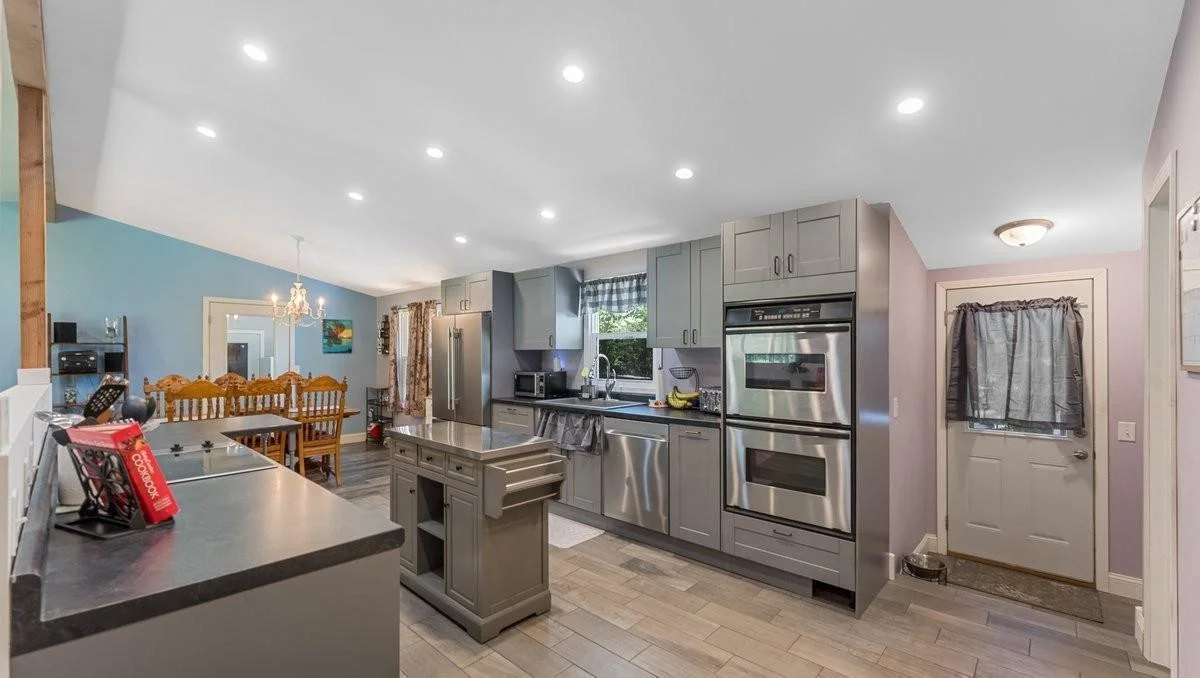 Large open kitchen with pantry! Double ovens, cooktop, dishwasher, Refrigerator