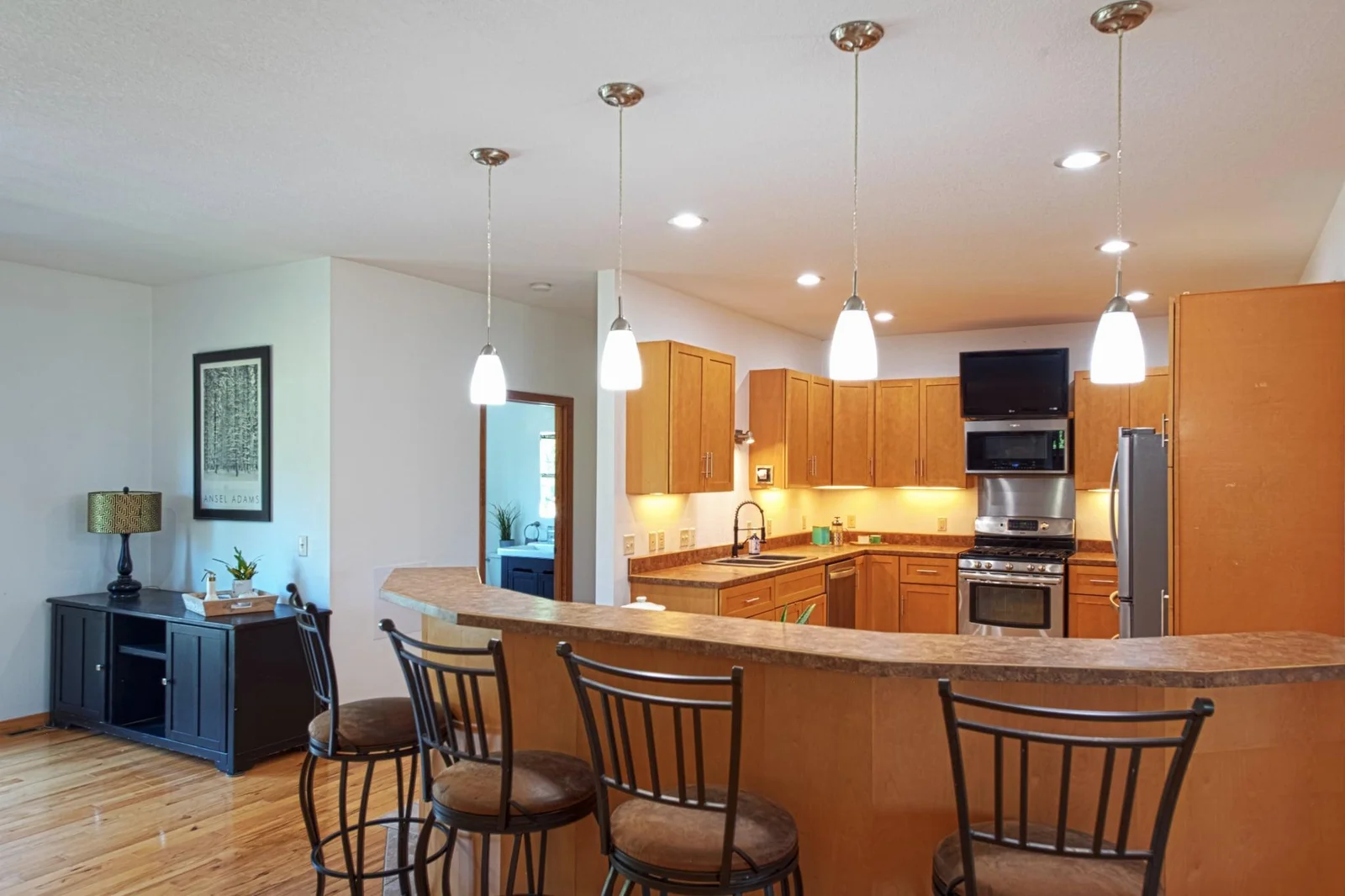 Large breakfast bar with plenty of seating.
