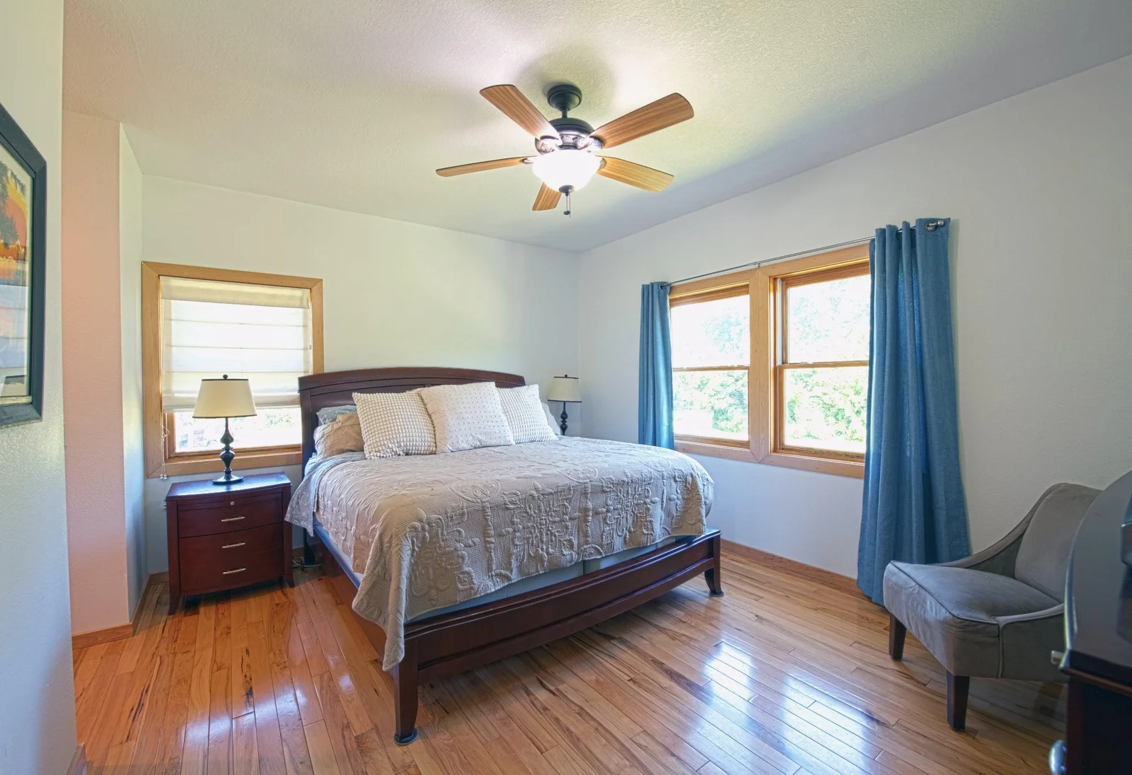 Primary bedroom - spacious with views of the wooded backyard.