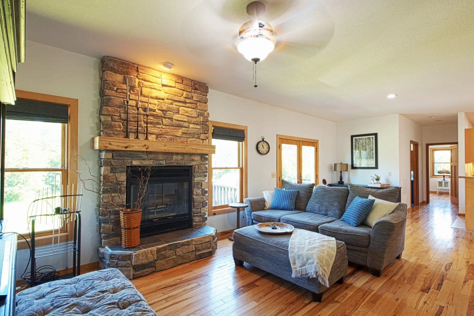 Floor to ceiling stone woodburning fireplace.  A great place to curl up on a cold winter's day.