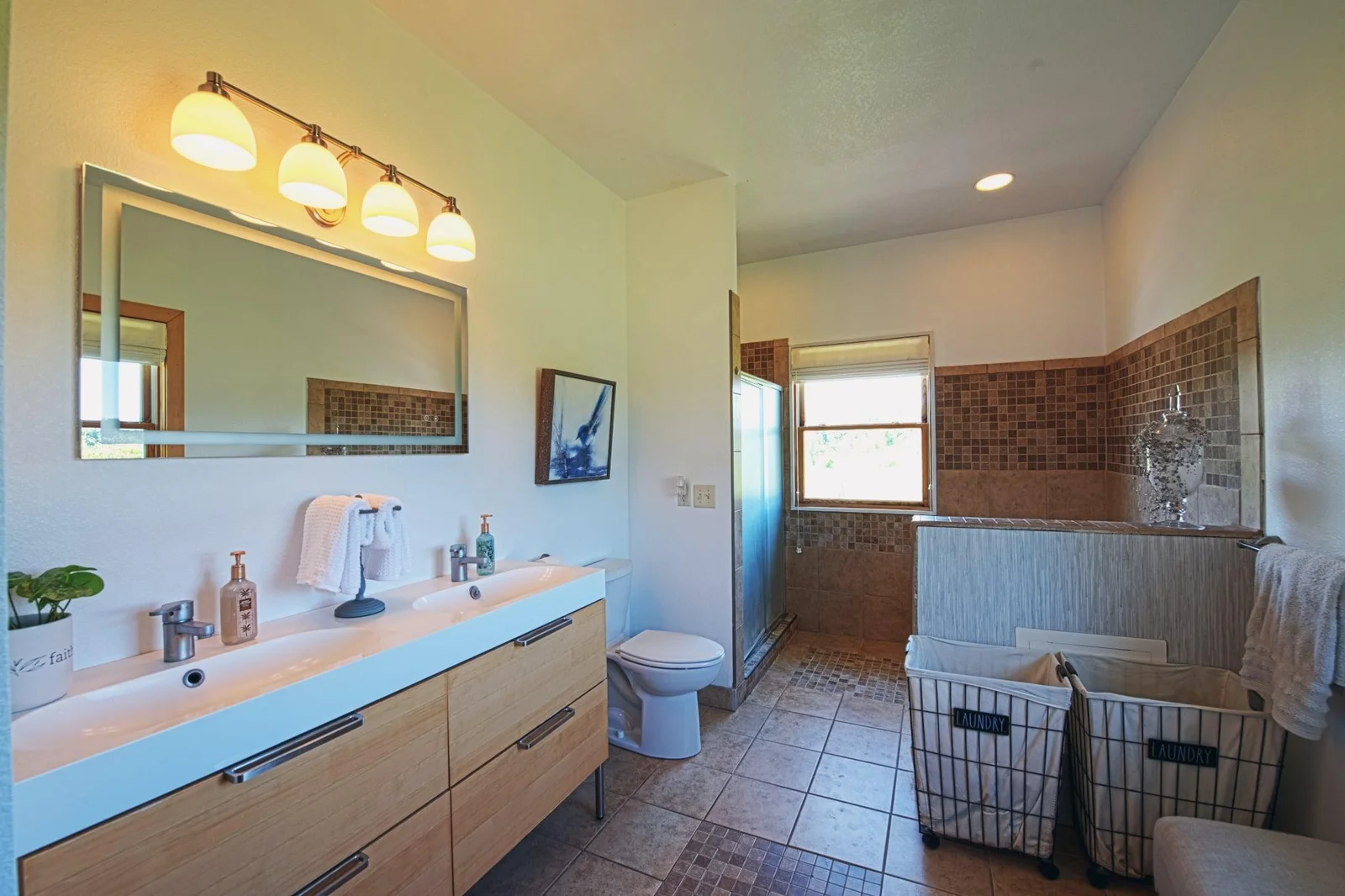 You'll love the space in this ensuite bathroom. You'll love the Jacuzzi tub and double sinks!