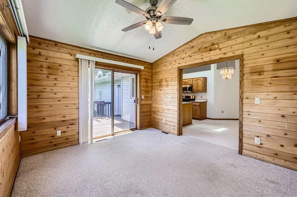 Enjoy the sun in this gorgeous Sun Room just off of the eating area and kitchen.  Easy deck access!