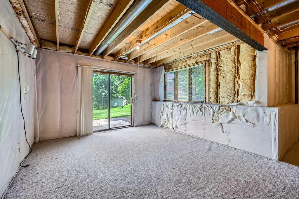Unfinished lower level walks out to patio!