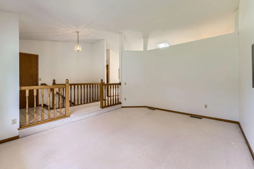 Vaulted Living Room is open to the Kitchen.