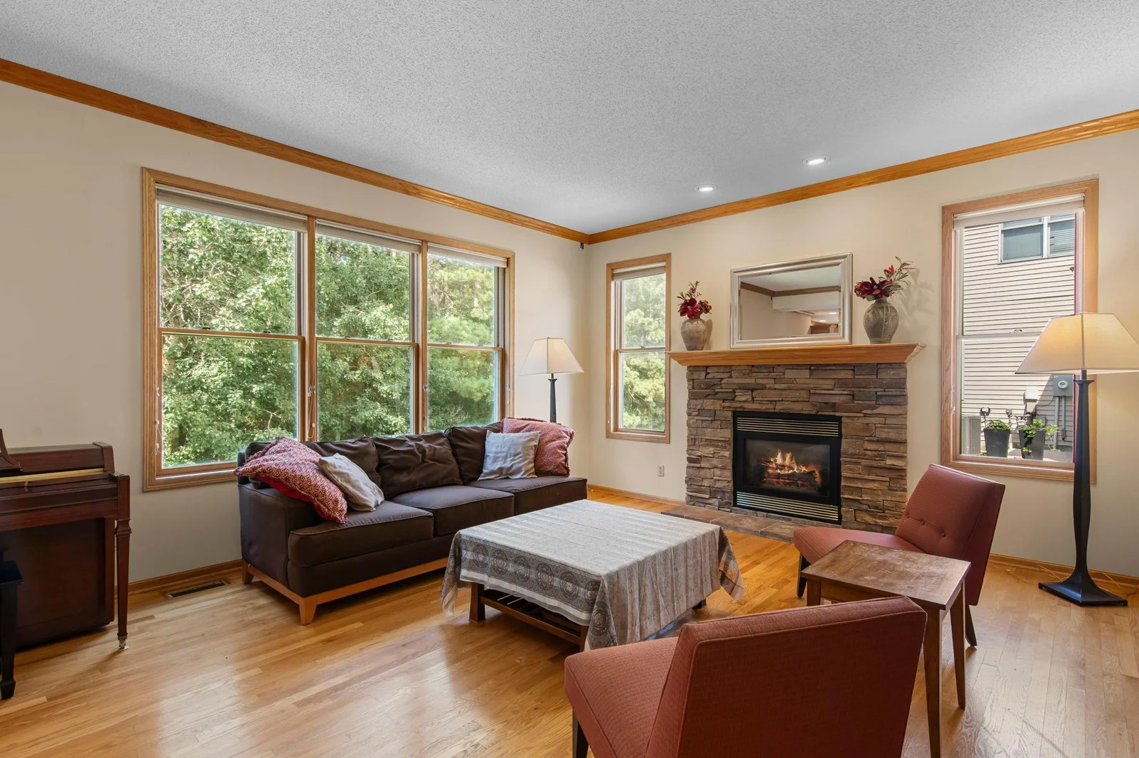 Living area offers large windows giving off tons of natural light