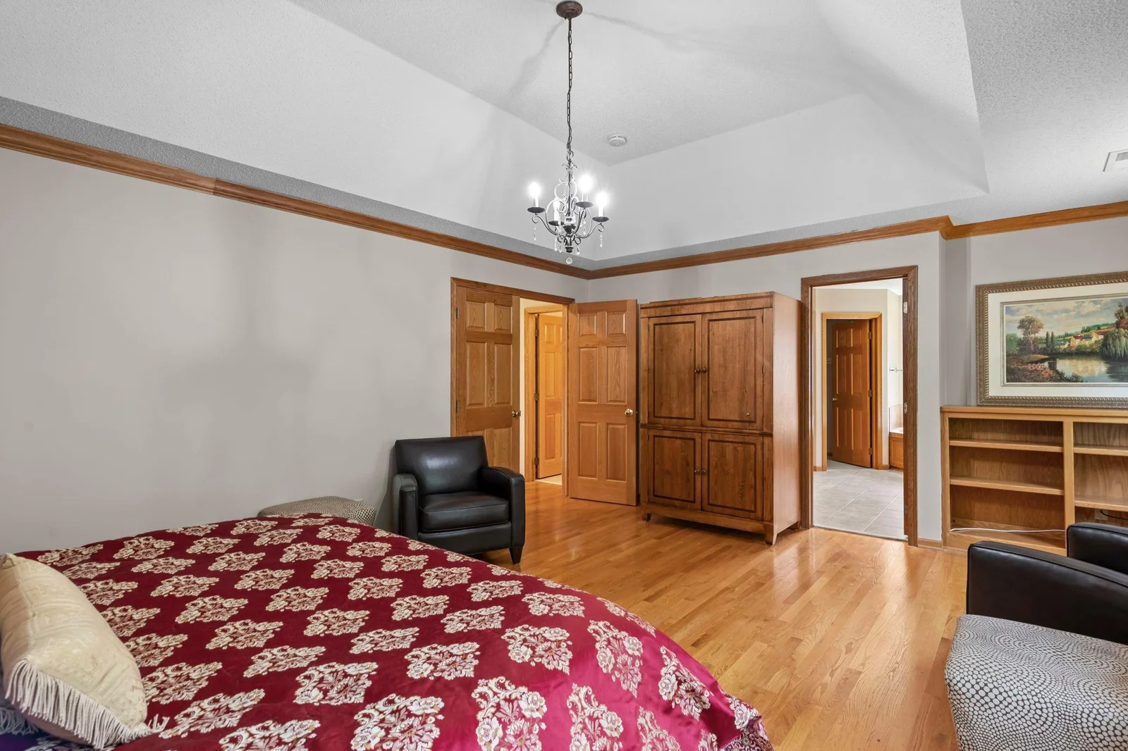Upper level primary bedroom with ensuite