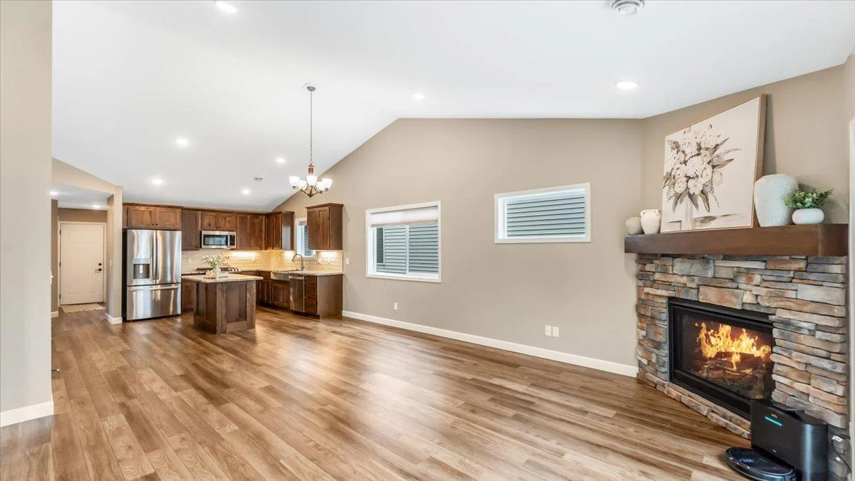 Bricked in fireplace acts as a focal point from multiple rooms.
