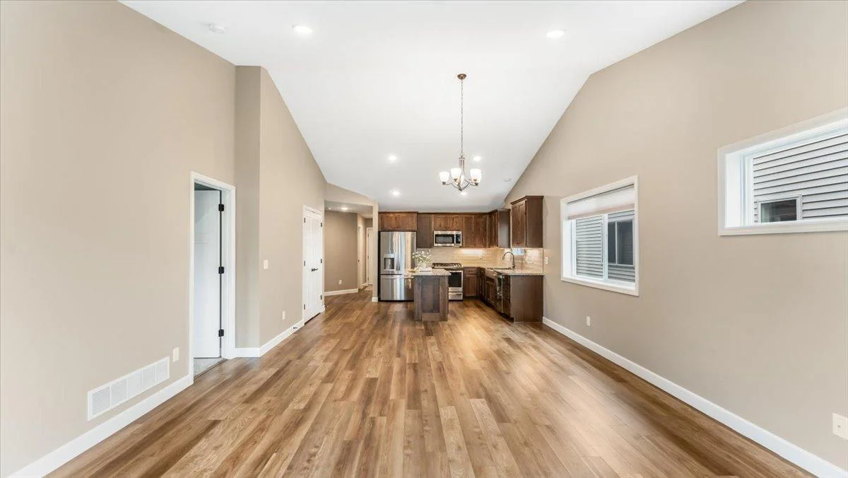 Room for dining and living adjacent to the kitchen.