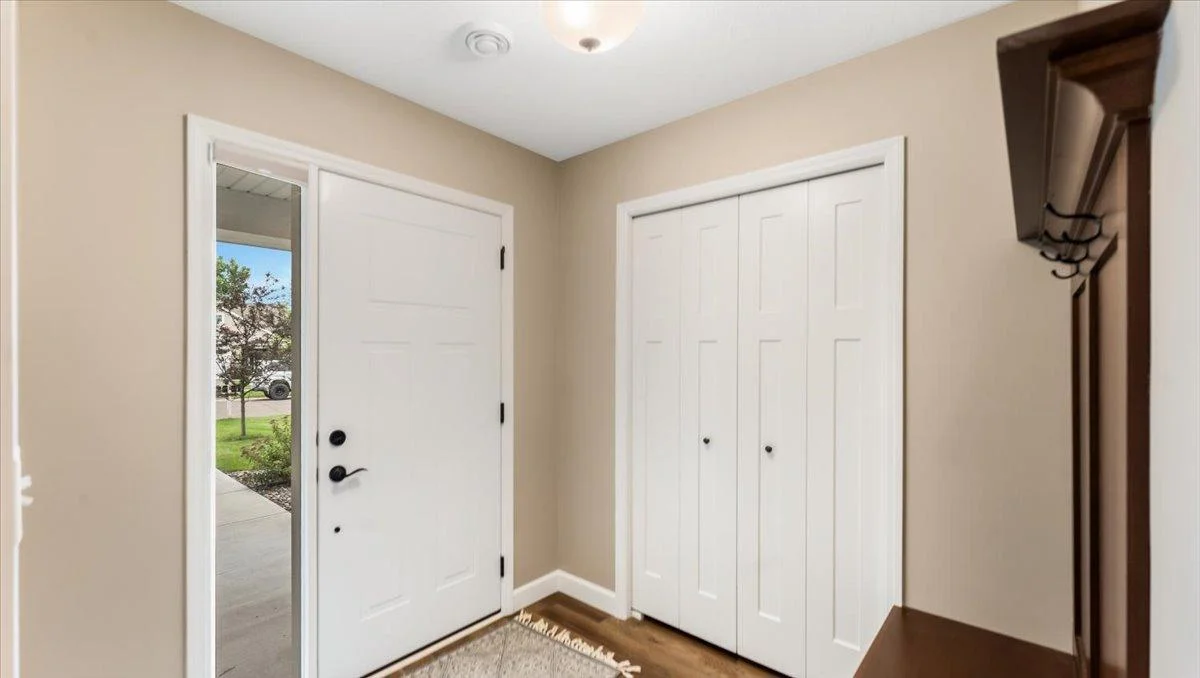 Step into this spacious foyer with closet space to store your outdoor apparel.