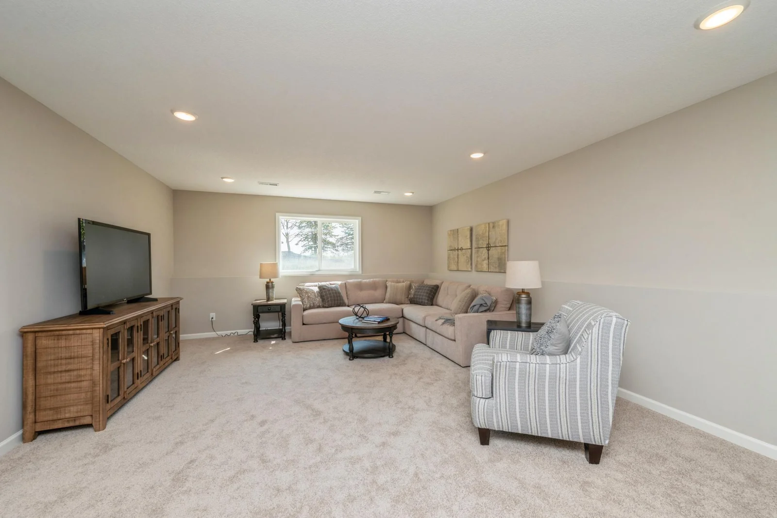 Lower Level View. Photo is of former model home. See Sales Consultant for Specific Colors and Options. Ability to choose!
