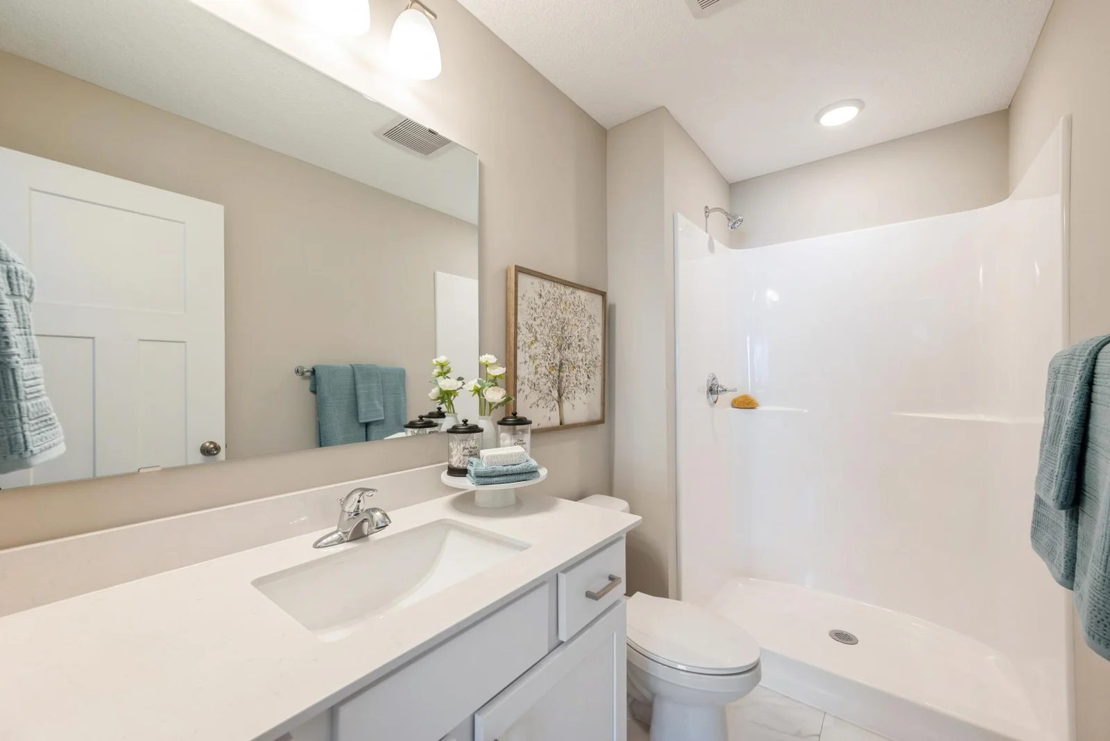 Primary Bathroom. Photo is of former model home. See Sales Consultant for Specific Colors and Options. Ability to choose!