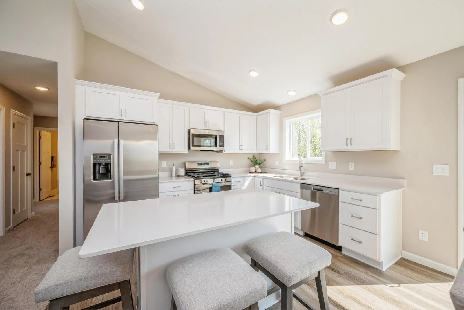 Kitchen View. Photo is of former model home. See Sales Consultant for Specific Colors and Options. Ability to choose!