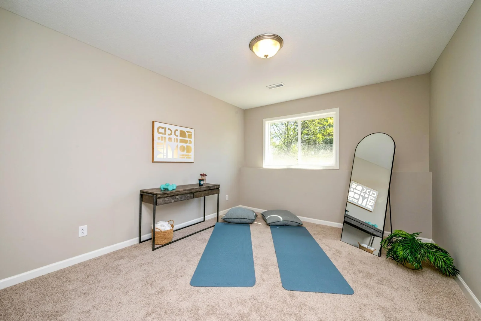Lower Level Bedroom. Photo is of former model home. See Sales Consultant for Specific Colors and Options. Ability to choose!