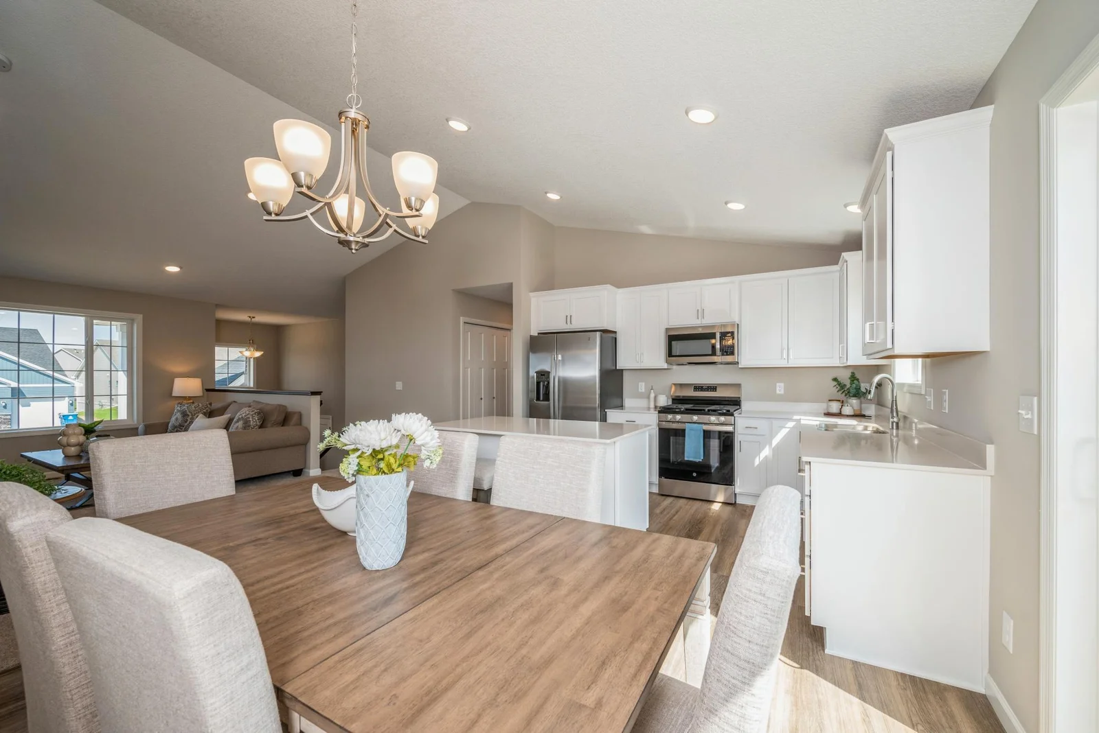 Dining Room-Kitchen View. Photo is of former model home. See Sales Consultant for Specific Colors and Options. Ability to choose!
