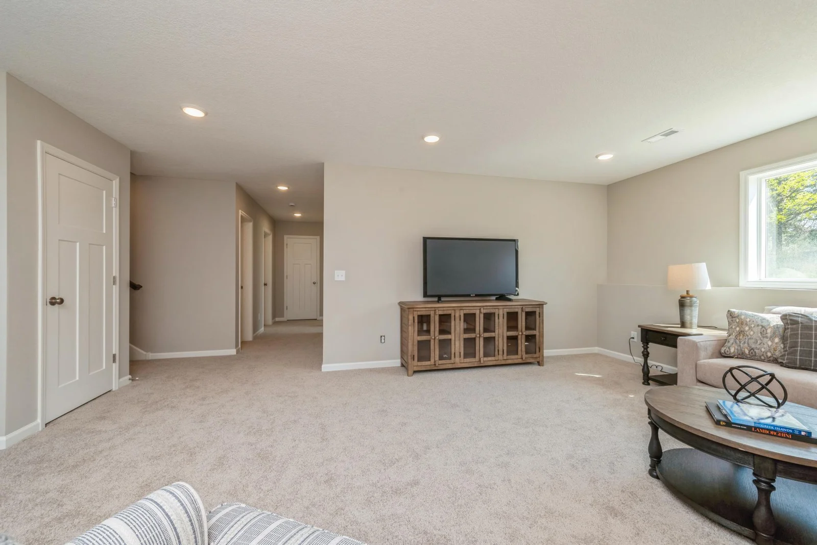 Lower Level View. Photo is of former model home. See Sales Consultant for Specific Colors and Options. Ability to choose!