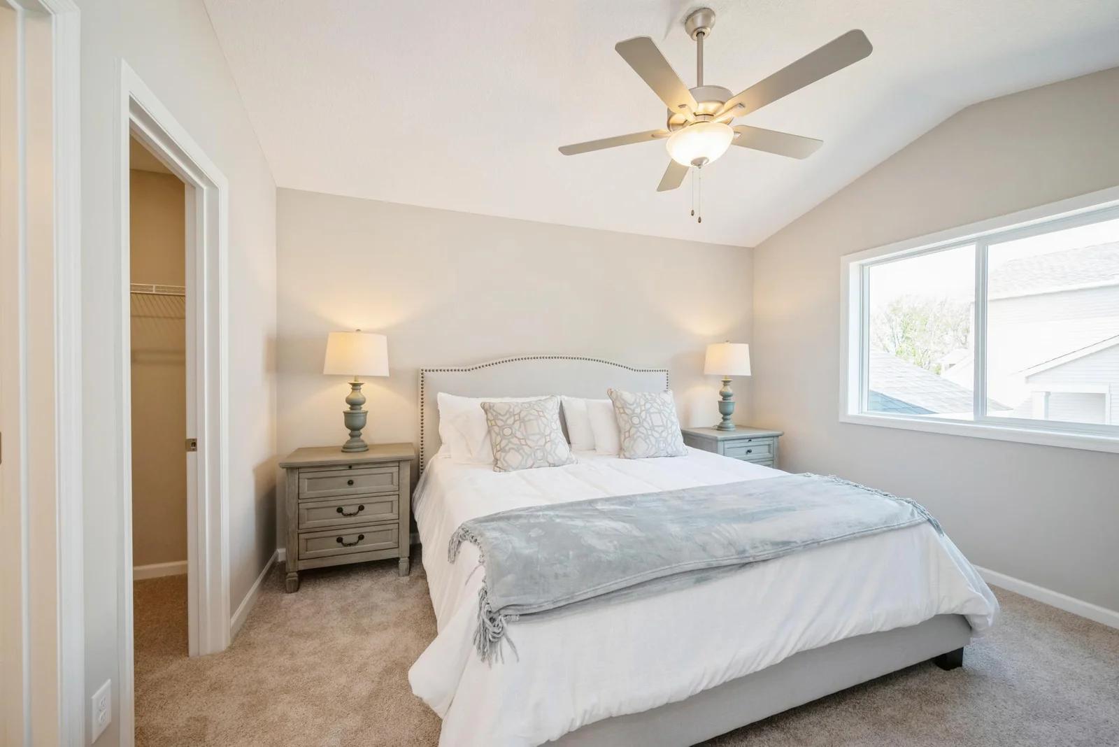 Primary Bedroom. Photo is of former model home. See Sales Consultant for Specific Colors and Options. Ability to choose!