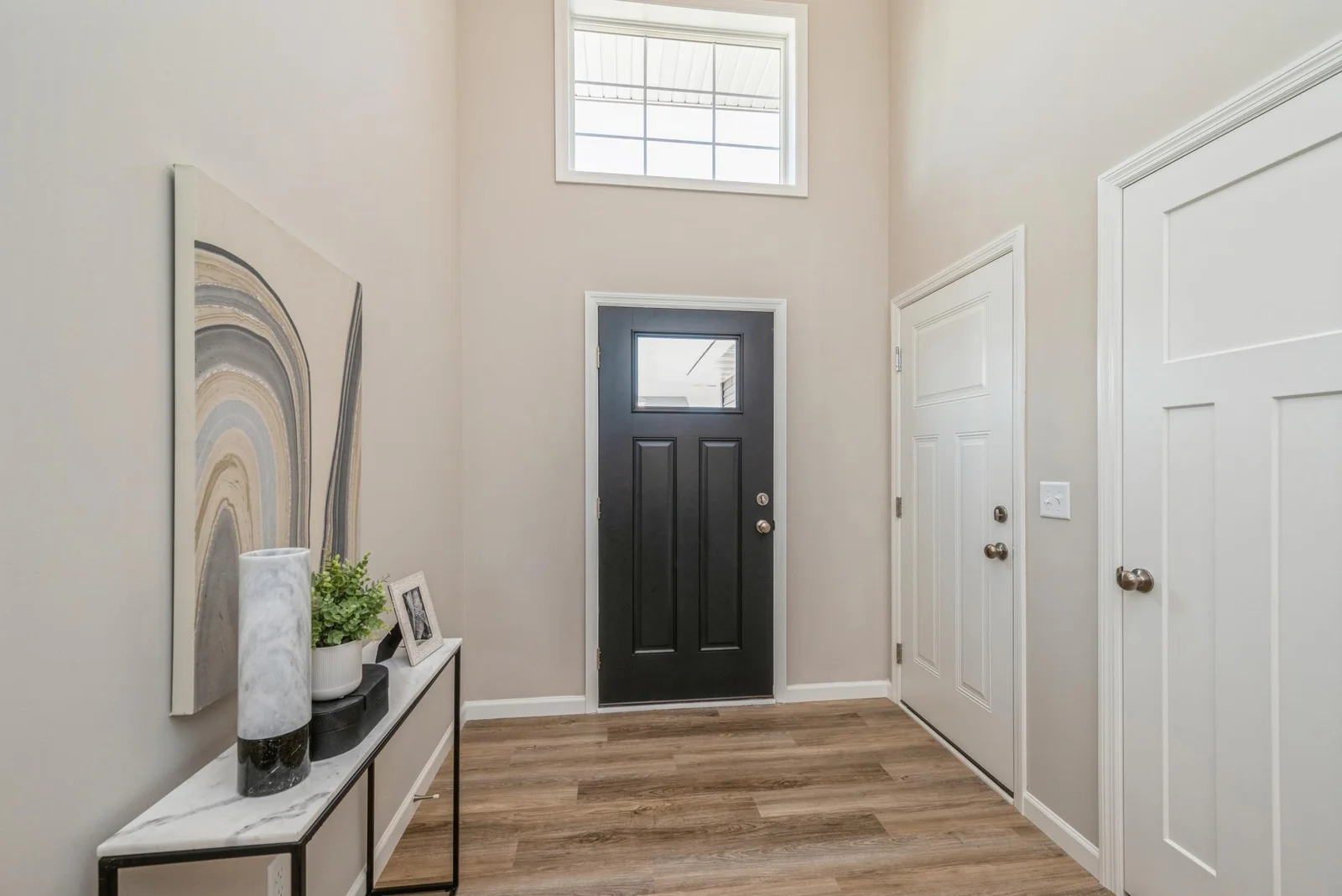 Entry. Photo is of former model home. See Sales Consultant for Specific Colors and Options. Ability to choose!