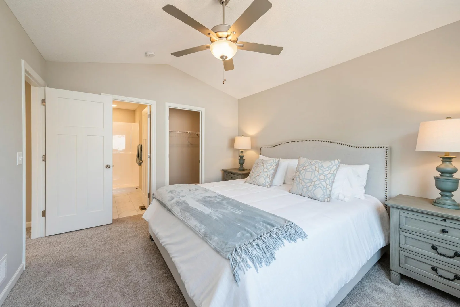 Primary Bedroom. Photo is of former model home. See Sales Consultant for Specific Colors and Options. Ability to choose!