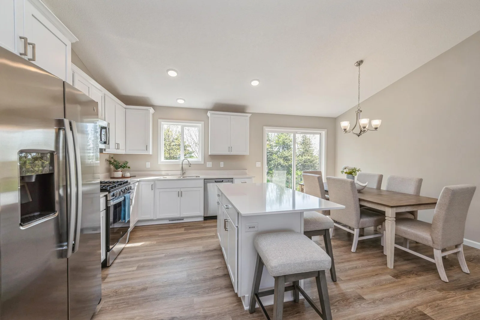 Kitchen - Dining View. Photo is of former model home. See Sales Consultant for Specific Colors and Options. Ability to choose!