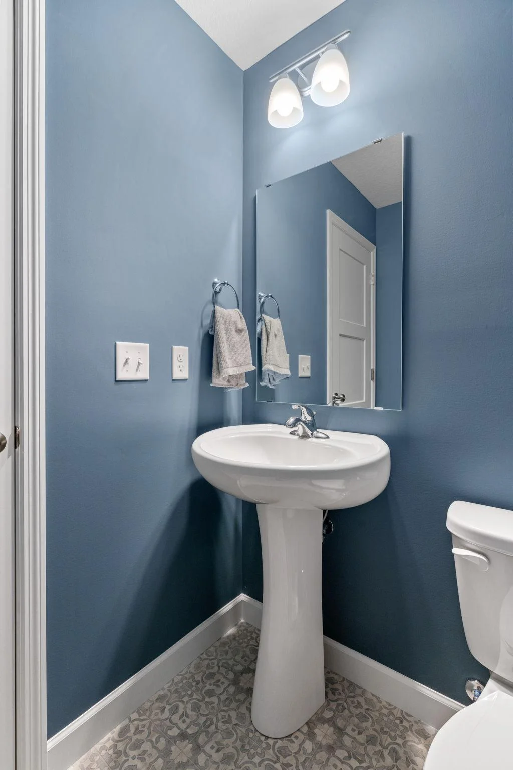 8. Bathroom (Half). Photo is of former model home. See Sales Consultant for Specific Colors and Options. Ability to choose!