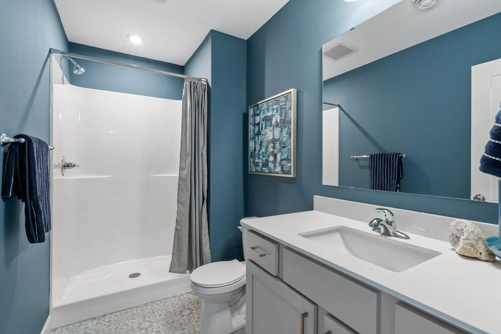 20. Bathroom (Basement). Photo is of former model home. See Sales Consultant for Specific Colors and Options. Ability to choose!