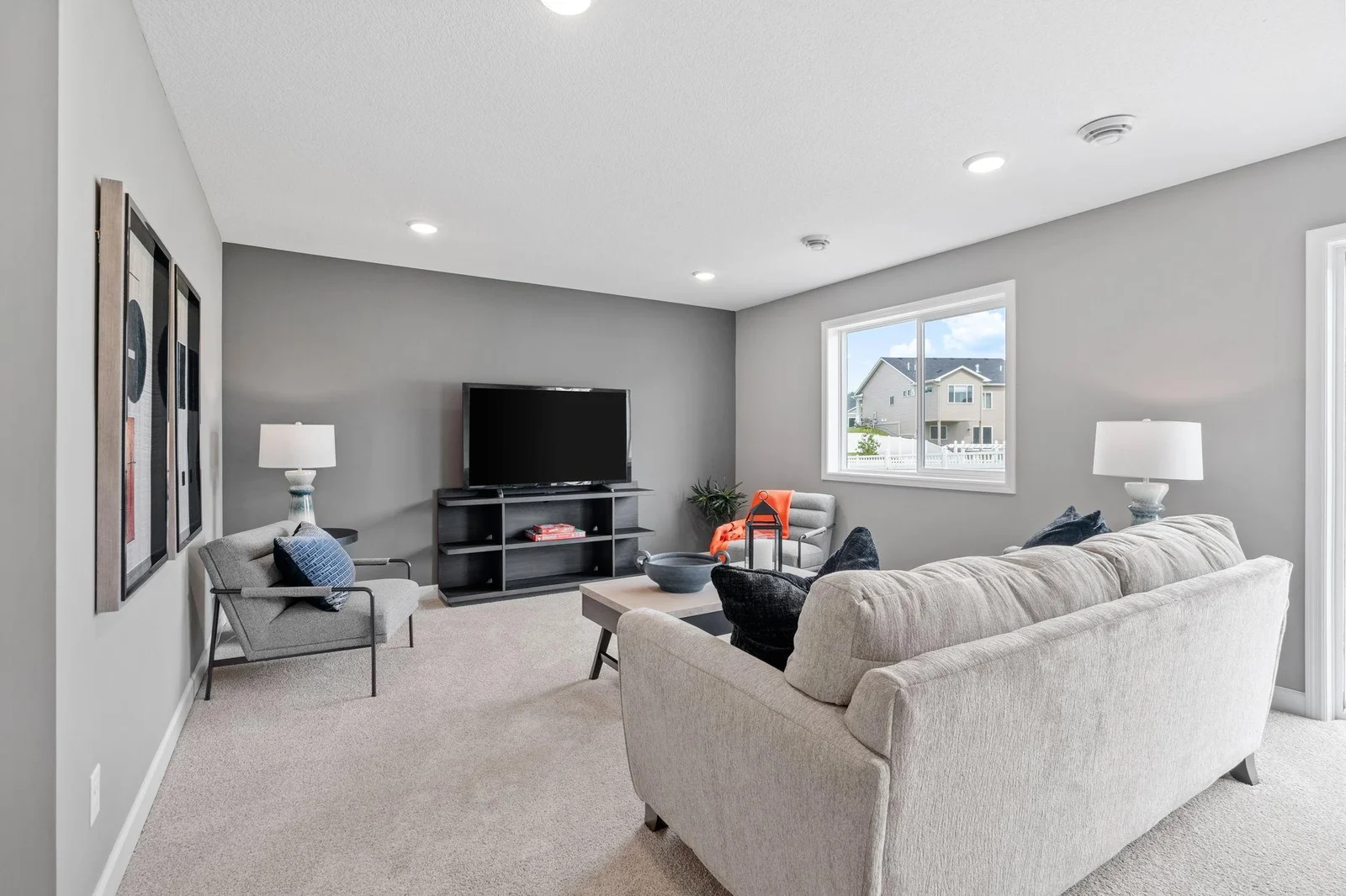 17. Family Room. Photo is of former model home. See Sales Consultant for Specific Colors and Options. Ability to choose!