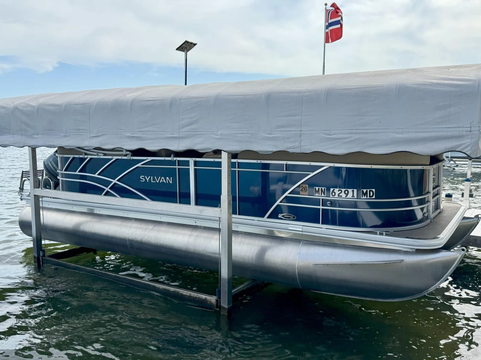 23-Pontoon with motor, lift, and trailer included (1).jpg