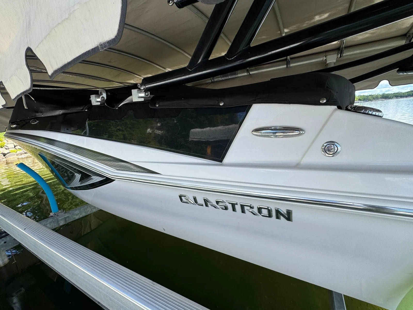 23-Glastron boat and motor, lift, and trailer included (3).jpg