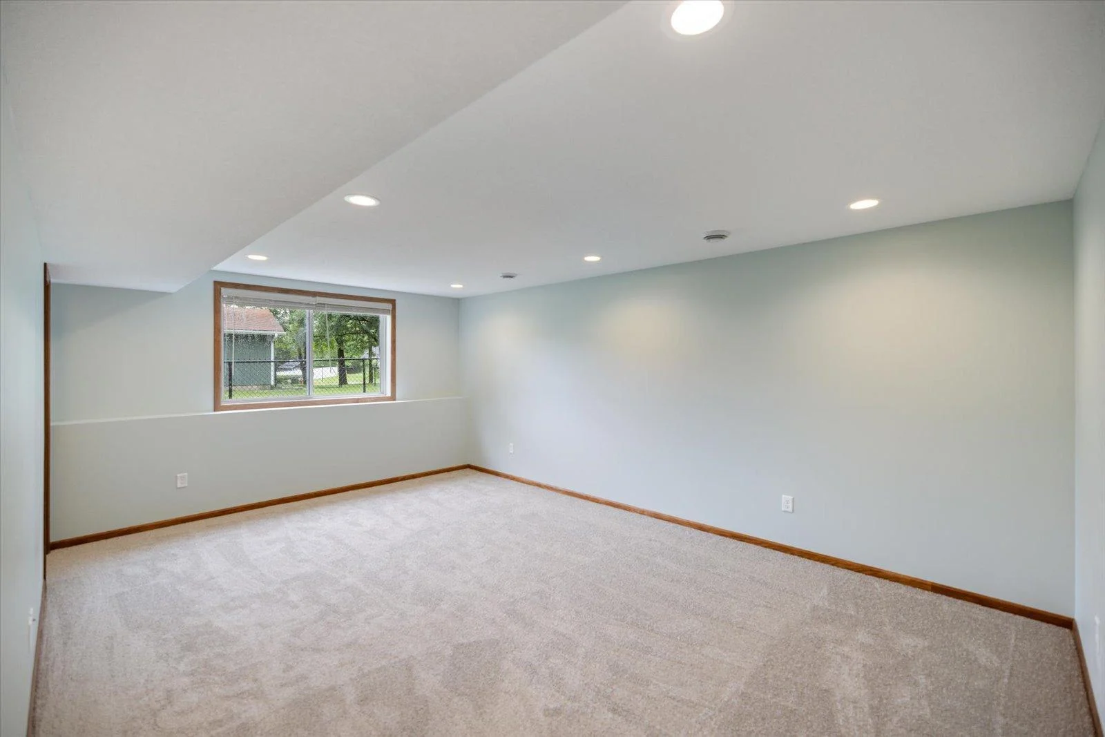 Another view of the bright family room in the lower level.