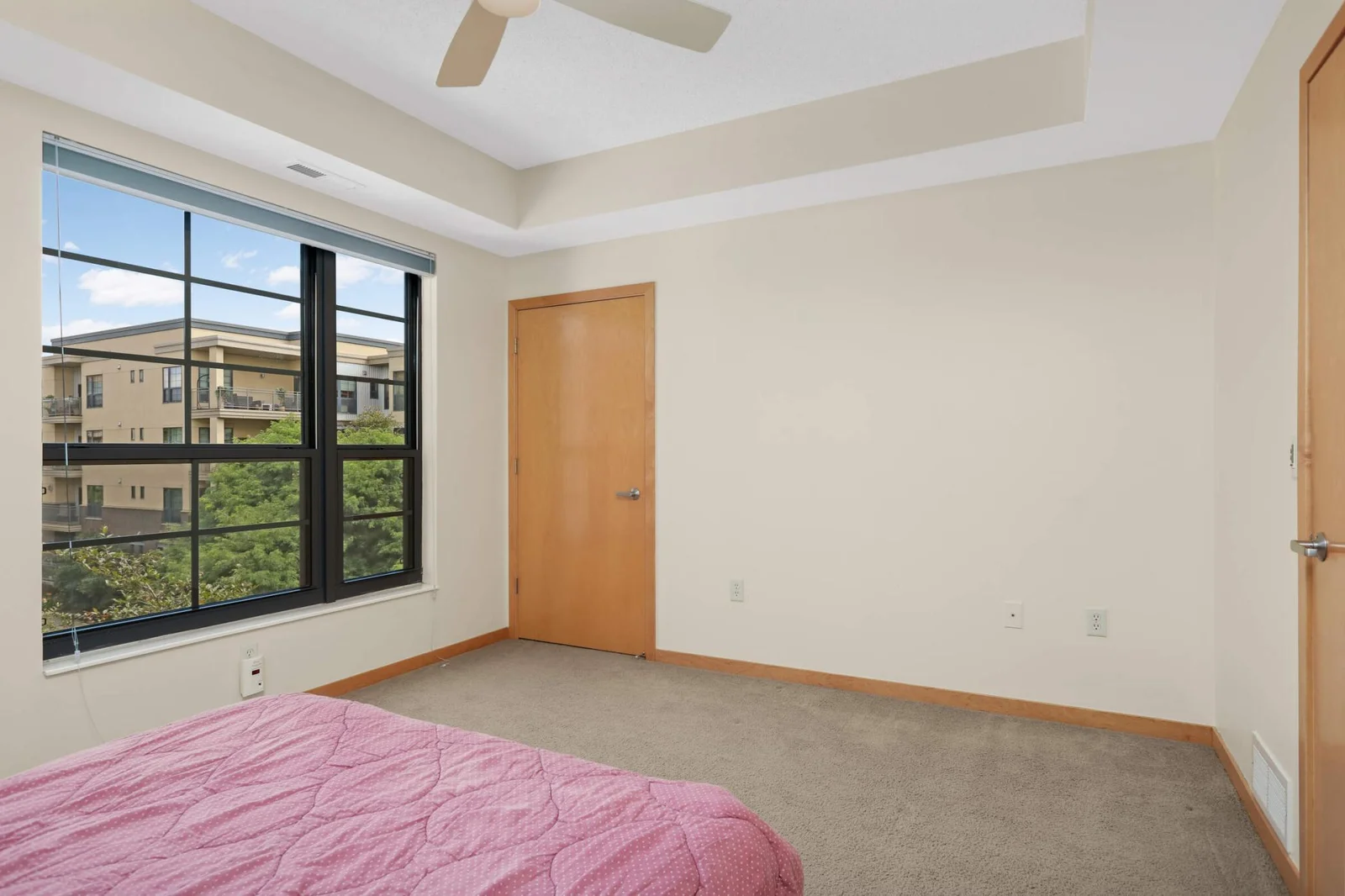 Bedroom features large walk-in closet