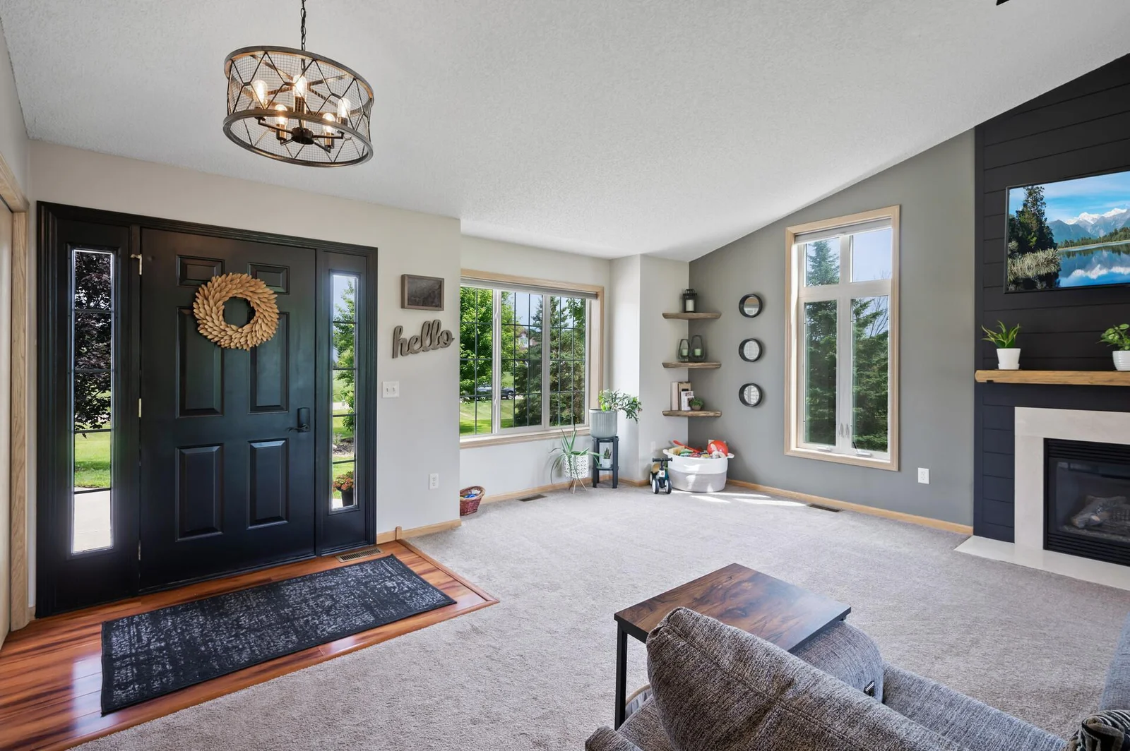 Walk right into your amazing and spacious living room with vaulted ceilings and lots of natural light.