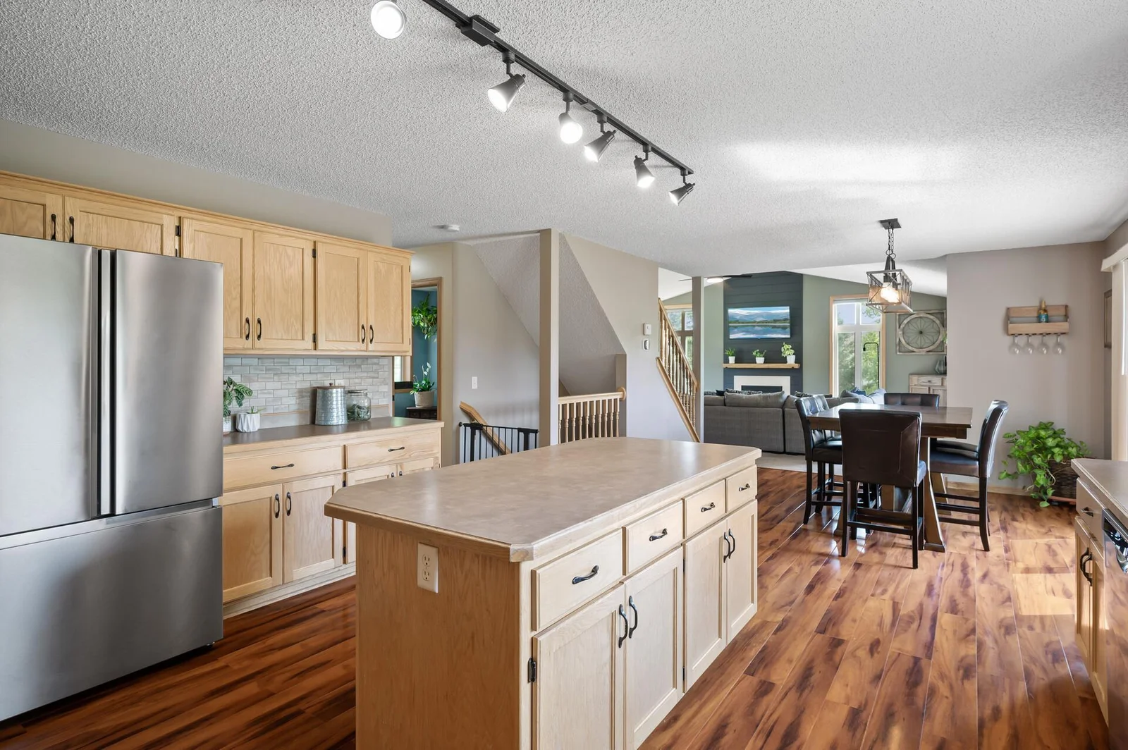 Stylish backsplash and solid oak cabinets.