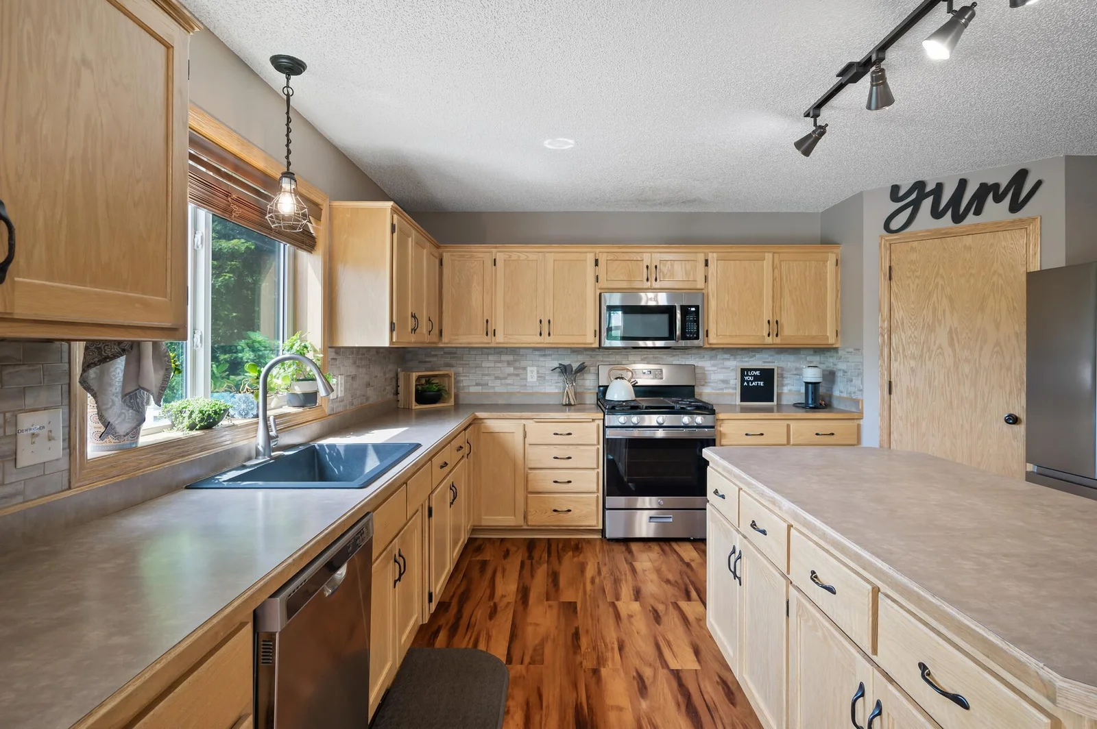 No shortage of counterspace and gas stove top.