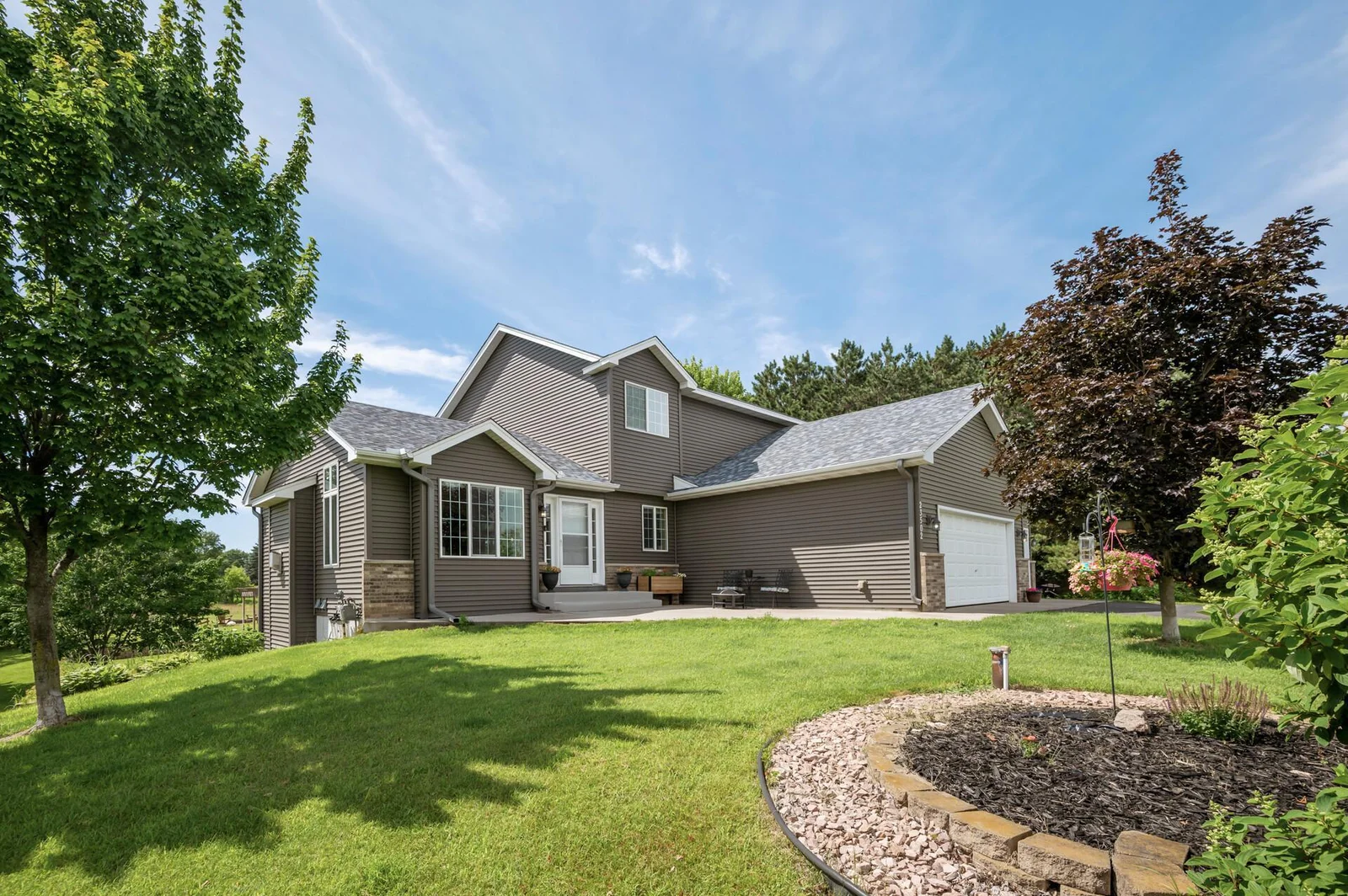 Inviting front entry with nice patio area.