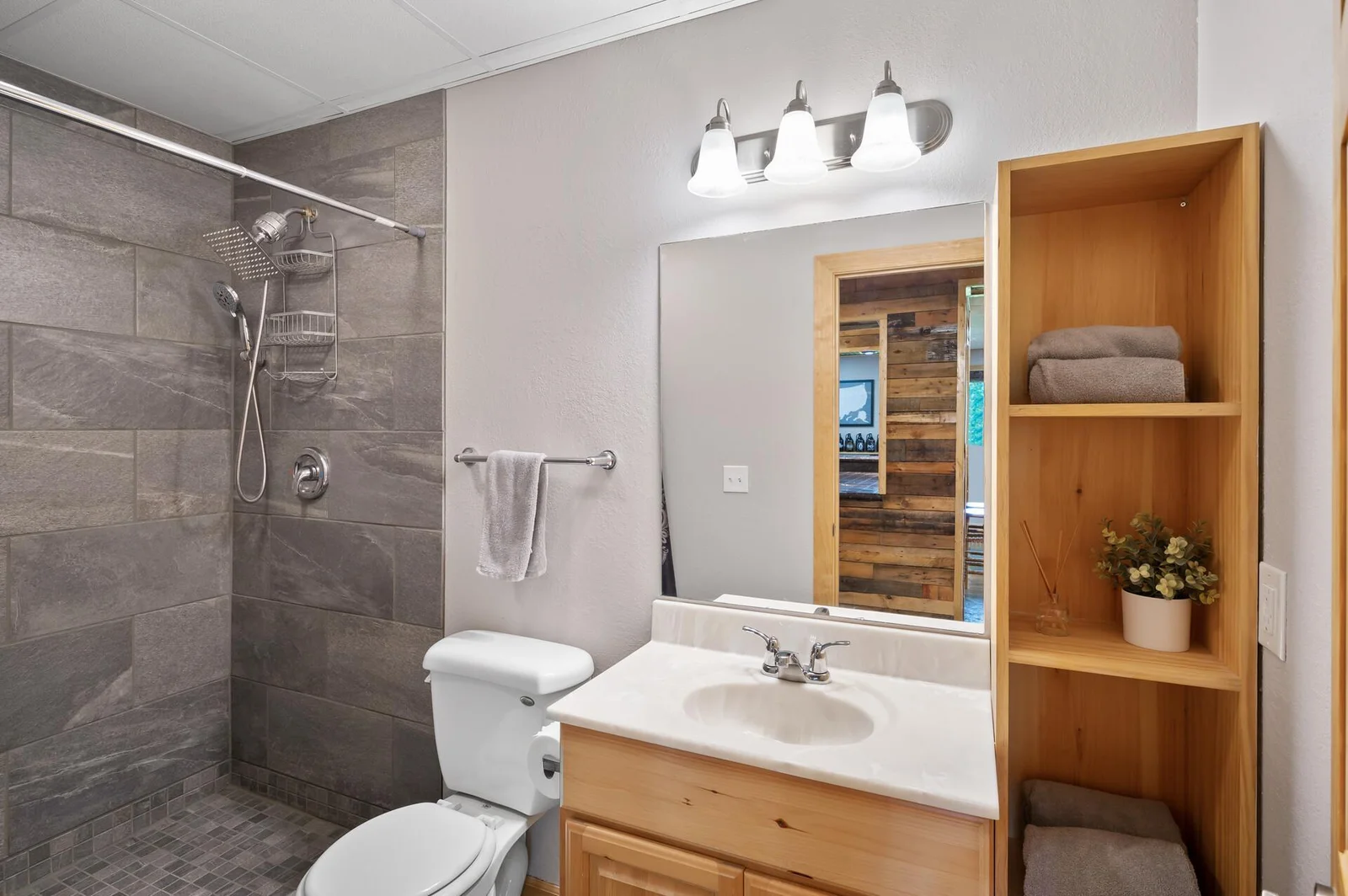 Lower-level bathroom with stunning tilework
