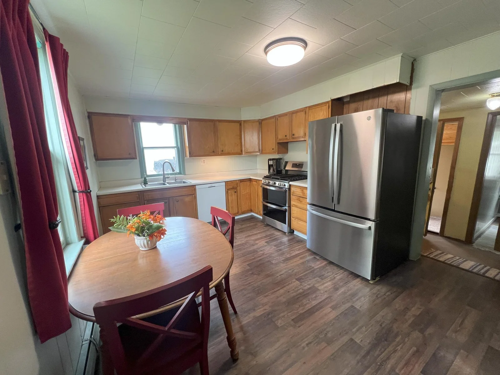 Kitchen features newer SS Refrigerator Range Oven.jpg