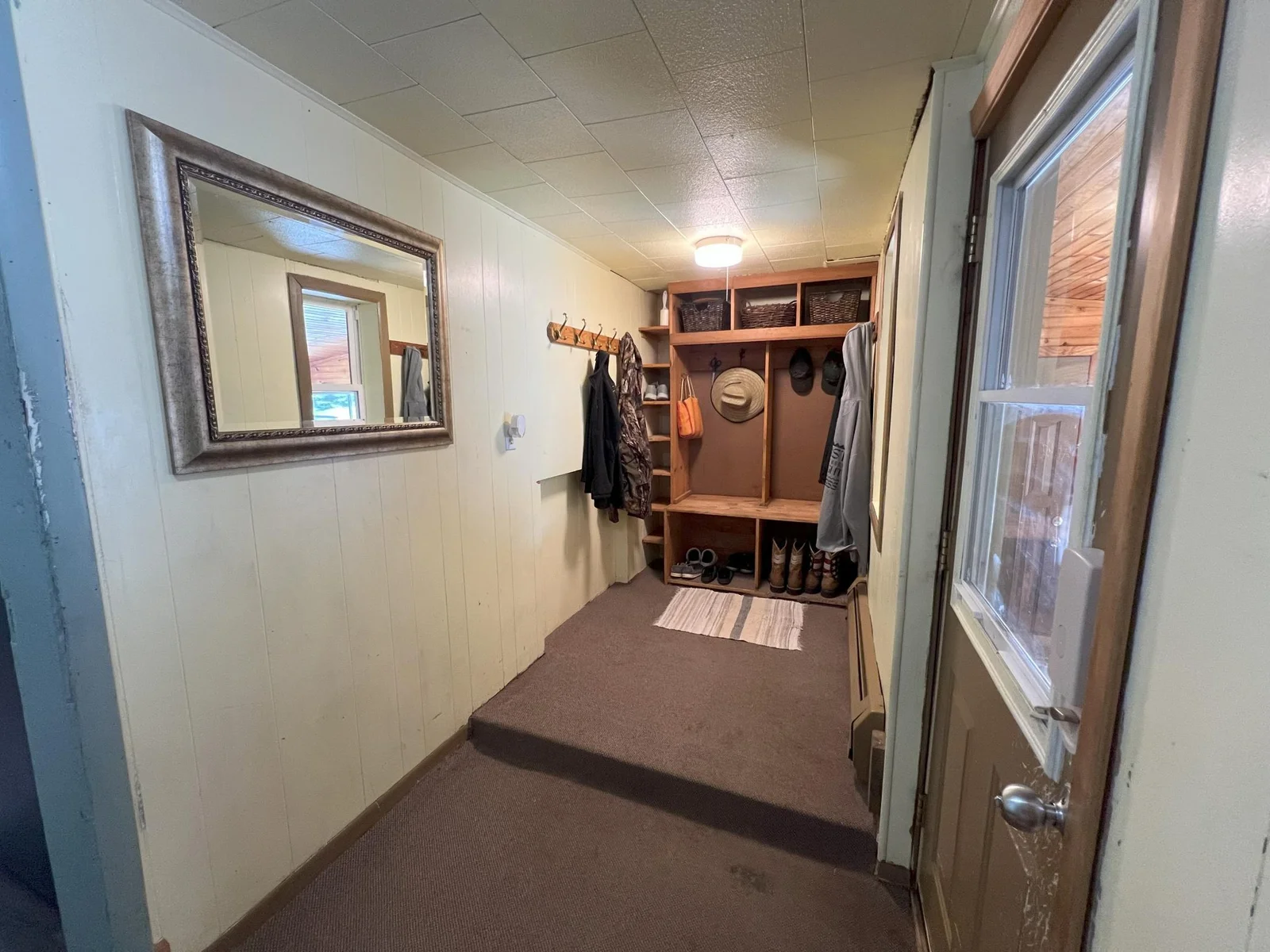 Generous sized mudroom space from porch.jpg