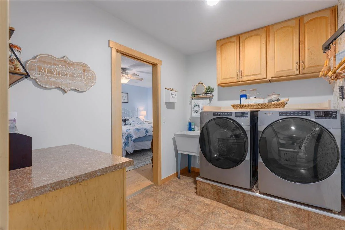 07-Main floor laundry right off the primary bedroom with a beautiful new high end washer and dryer