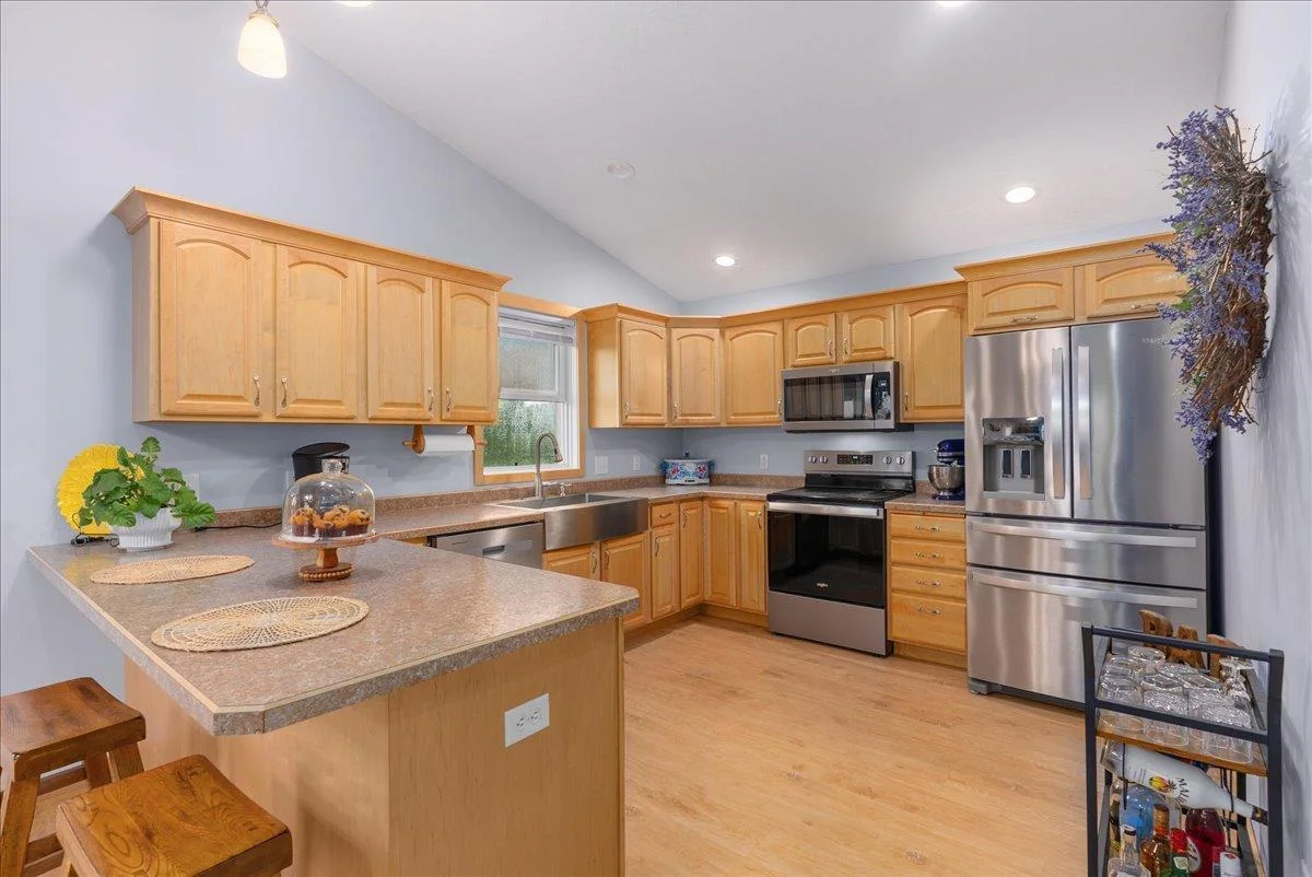 Big beautiful kitchen with all new stainless appliances