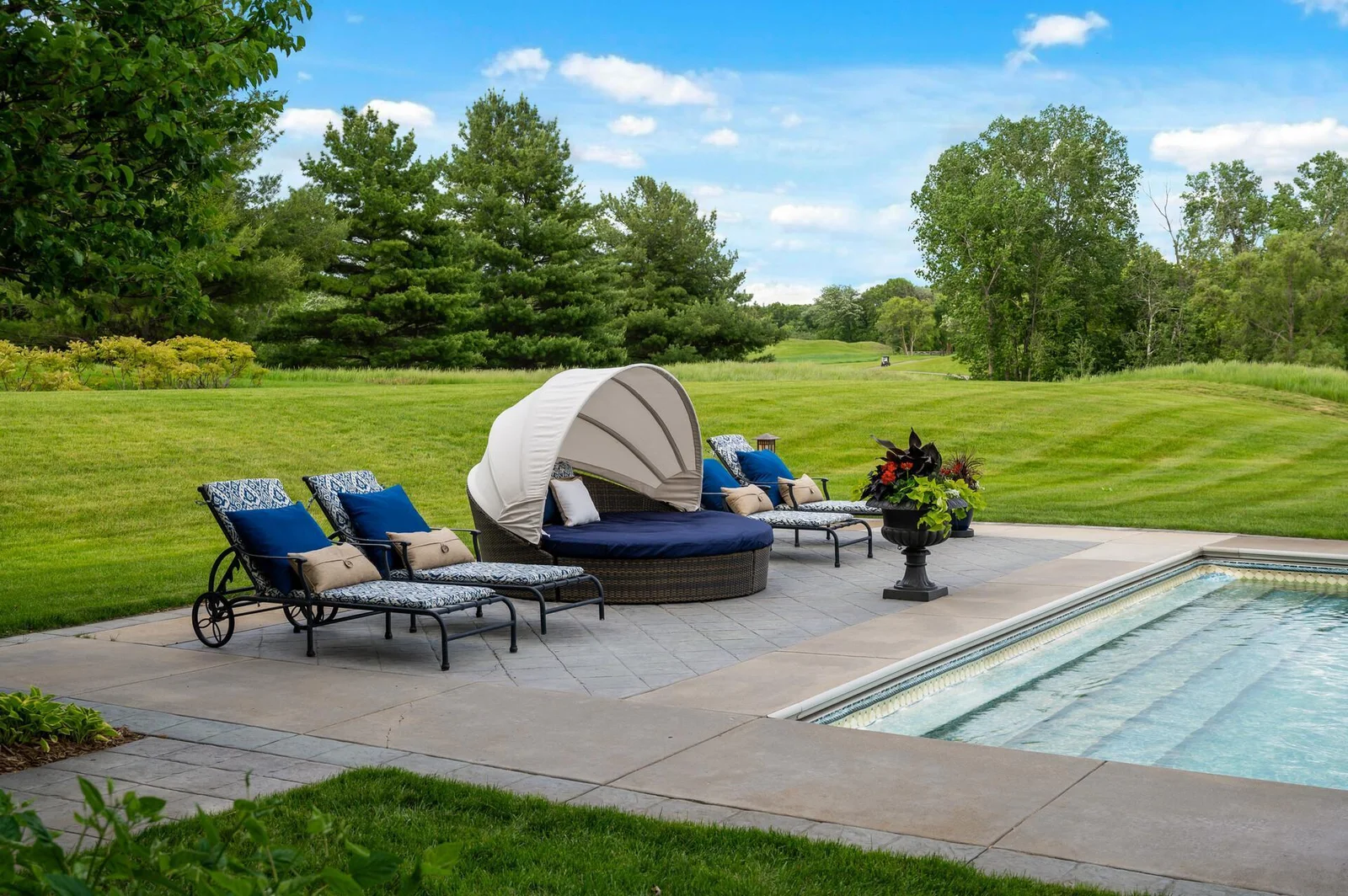 Poolside relaxation with stunning views.