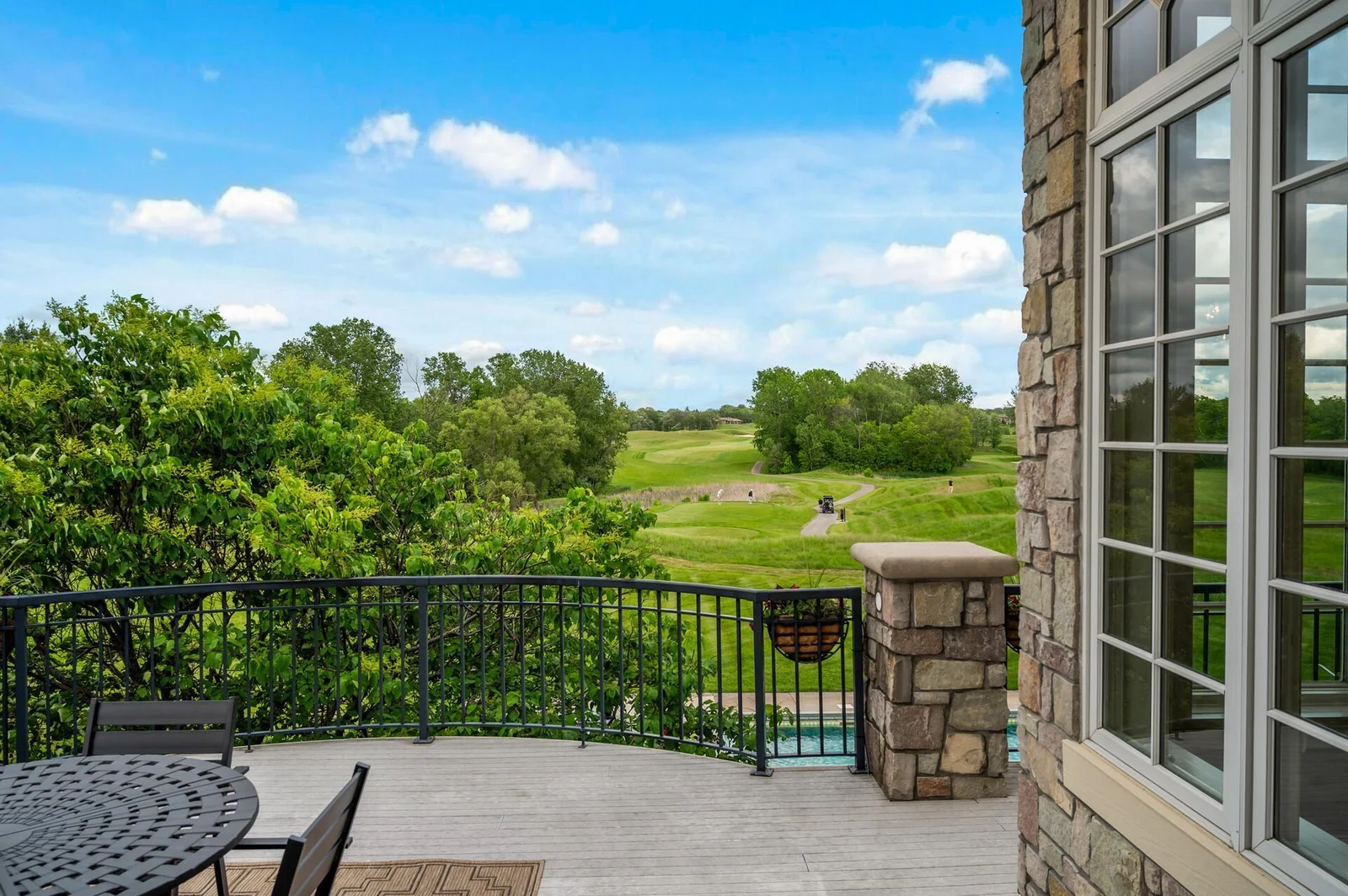 This expansive upper deck offers an exceptional outdoor living space with stunning panoramic views.